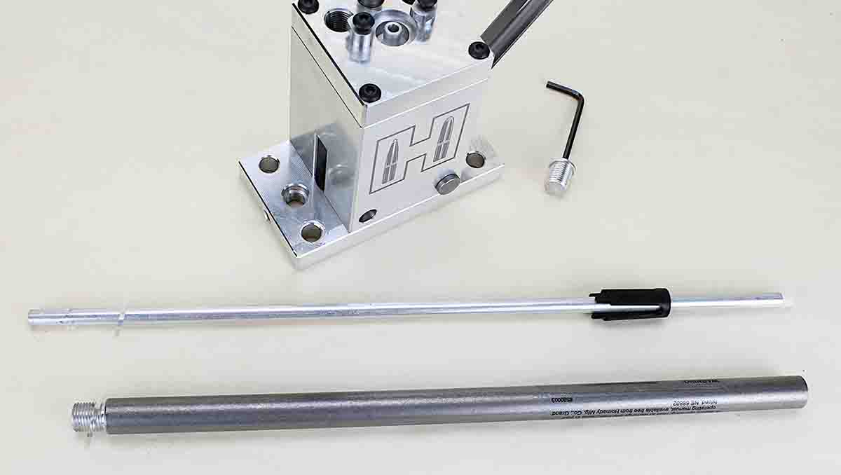 A steel tube (bottom) surrounds the primer tube to provide safety to the handloader in case of a primer detonation.